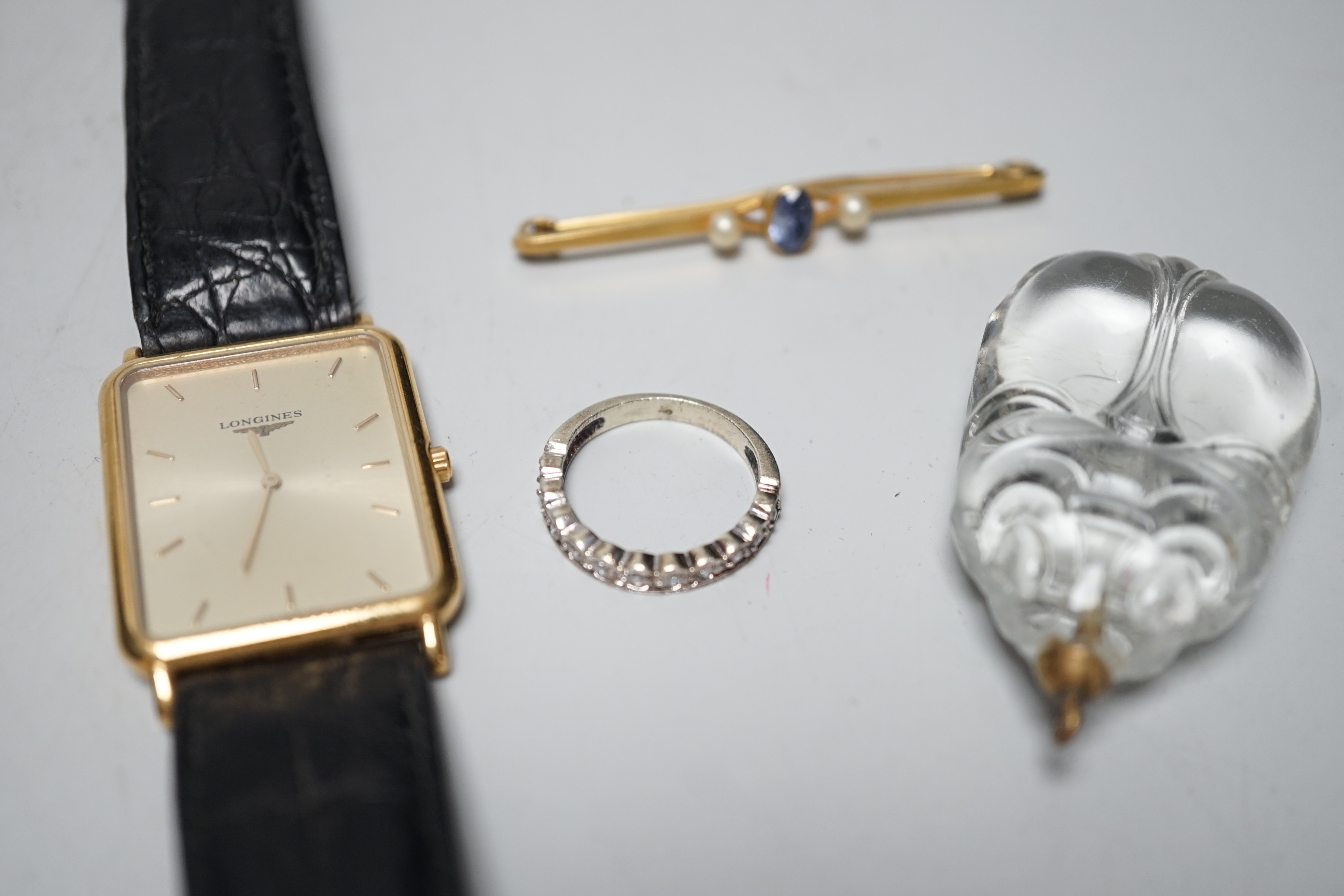 A gentleman's steel and gold plated Longines Le Grand Classique quartz wrist watch, a 9ct and gem set bar brooch and two other items.